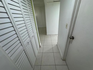 2/2 CONDOMINIUM FOR SALE IN DESIRABLE VERY ACTIVE COMMUNITY AT on Oriole Golf and Tennis Club in Florida - for sale on GolfHomes.com, golf home, golf lot