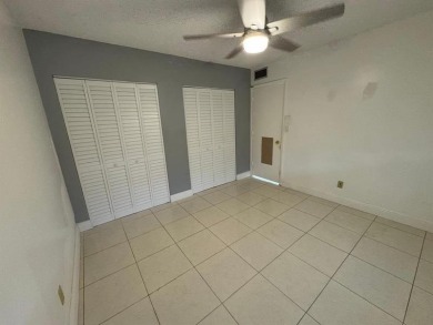 2/2 CONDOMINIUM FOR SALE IN DESIRABLE VERY ACTIVE COMMUNITY AT on Oriole Golf and Tennis Club in Florida - for sale on GolfHomes.com, golf home, golf lot