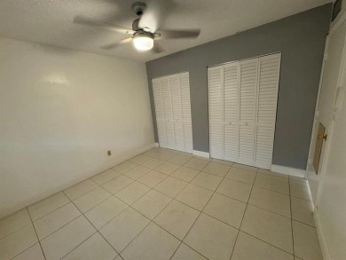 2/2 CONDOMINIUM FOR SALE IN DESIRABLE VERY ACTIVE COMMUNITY AT on Oriole Golf and Tennis Club in Florida - for sale on GolfHomes.com, golf home, golf lot