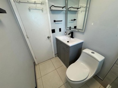 2/2 CONDOMINIUM FOR SALE IN DESIRABLE VERY ACTIVE COMMUNITY AT on Oriole Golf and Tennis Club in Florida - for sale on GolfHomes.com, golf home, golf lot