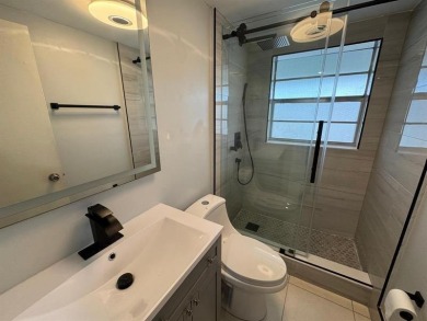 2/2 CONDOMINIUM FOR SALE IN DESIRABLE VERY ACTIVE COMMUNITY AT on Oriole Golf and Tennis Club in Florida - for sale on GolfHomes.com, golf home, golf lot