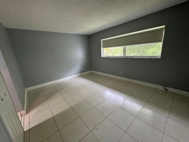 2/2 CONDOMINIUM FOR SALE IN DESIRABLE VERY ACTIVE COMMUNITY AT on Oriole Golf and Tennis Club in Florida - for sale on GolfHomes.com, golf home, golf lot