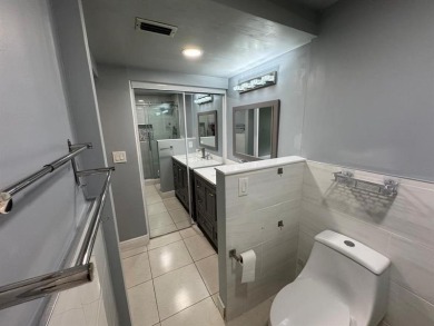2/2 CONDOMINIUM FOR SALE IN DESIRABLE VERY ACTIVE COMMUNITY AT on Oriole Golf and Tennis Club in Florida - for sale on GolfHomes.com, golf home, golf lot