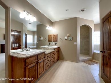 Luxury can become a habit in this elegant Earth & Stone custom on San Juan Country Club in New Mexico - for sale on GolfHomes.com, golf home, golf lot