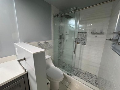 2/2 CONDOMINIUM FOR SALE IN DESIRABLE VERY ACTIVE COMMUNITY AT on Oriole Golf and Tennis Club in Florida - for sale on GolfHomes.com, golf home, golf lot