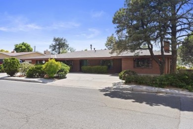 Located on the UNM golf course in prestigious NORTH CAMPUS on North Course - University of New Mexico  in New Mexico - for sale on GolfHomes.com, golf home, golf lot