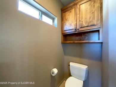 Luxury can become a habit in this elegant Earth & Stone custom on San Juan Country Club in New Mexico - for sale on GolfHomes.com, golf home, golf lot