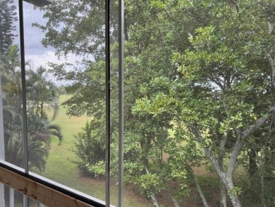 2/2 CONDOMINIUM FOR SALE IN DESIRABLE VERY ACTIVE COMMUNITY AT on Oriole Golf and Tennis Club in Florida - for sale on GolfHomes.com, golf home, golf lot