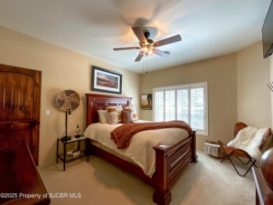 Luxury can become a habit in this elegant Earth & Stone custom on San Juan Country Club in New Mexico - for sale on GolfHomes.com, golf home, golf lot