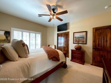 Luxury can become a habit in this elegant Earth & Stone custom on San Juan Country Club in New Mexico - for sale on GolfHomes.com, golf home, golf lot