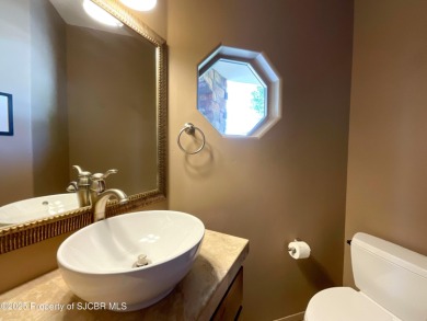 Luxury can become a habit in this elegant Earth & Stone custom on San Juan Country Club in New Mexico - for sale on GolfHomes.com, golf home, golf lot