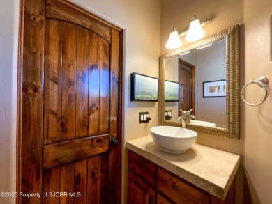 Luxury can become a habit in this elegant Earth & Stone custom on San Juan Country Club in New Mexico - for sale on GolfHomes.com, golf home, golf lot