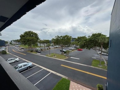 2/2 CONDOMINIUM FOR SALE IN DESIRABLE VERY ACTIVE COMMUNITY AT on Oriole Golf and Tennis Club in Florida - for sale on GolfHomes.com, golf home, golf lot