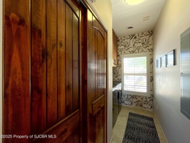 Luxury can become a habit in this elegant Earth & Stone custom on San Juan Country Club in New Mexico - for sale on GolfHomes.com, golf home, golf lot