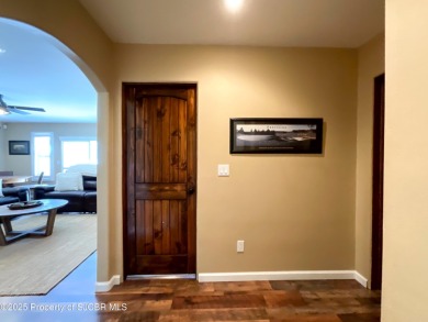 Luxury can become a habit in this elegant Earth & Stone custom on San Juan Country Club in New Mexico - for sale on GolfHomes.com, golf home, golf lot