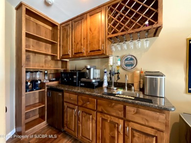 Luxury can become a habit in this elegant Earth & Stone custom on San Juan Country Club in New Mexico - for sale on GolfHomes.com, golf home, golf lot