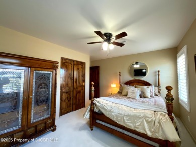 Luxury can become a habit in this elegant Earth & Stone custom on San Juan Country Club in New Mexico - for sale on GolfHomes.com, golf home, golf lot