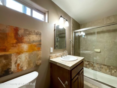 Luxury can become a habit in this elegant Earth & Stone custom on San Juan Country Club in New Mexico - for sale on GolfHomes.com, golf home, golf lot