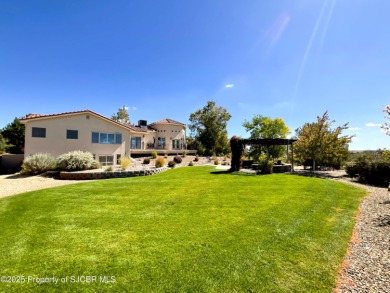 Luxury can become a habit in this elegant Earth & Stone custom on San Juan Country Club in New Mexico - for sale on GolfHomes.com, golf home, golf lot
