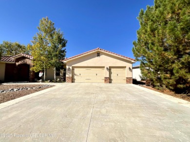 Luxury can become a habit in this elegant Earth & Stone custom on San Juan Country Club in New Mexico - for sale on GolfHomes.com, golf home, golf lot
