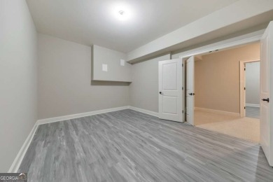 Nestled on 1.67 acres in The Overlook at Marietta Country Club on Marietta Country Club in Georgia - for sale on GolfHomes.com, golf home, golf lot