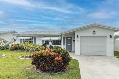 ROOF is 2018! Enjoy every sunny day in this delightful villa on Leisureville Community Golf Course in Florida - for sale on GolfHomes.com, golf home, golf lot