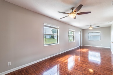 ROOF is 2018! Enjoy every sunny day in this delightful villa on Leisureville Community Golf Course in Florida - for sale on GolfHomes.com, golf home, golf lot