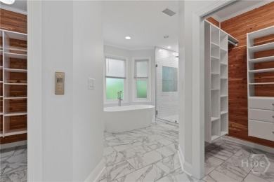 This beautifully updated home in The Landings offers privacy on The Landings Club - Palmetto in Georgia - for sale on GolfHomes.com, golf home, golf lot