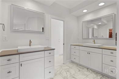 This beautifully updated home in The Landings offers privacy on The Landings Club - Palmetto in Georgia - for sale on GolfHomes.com, golf home, golf lot