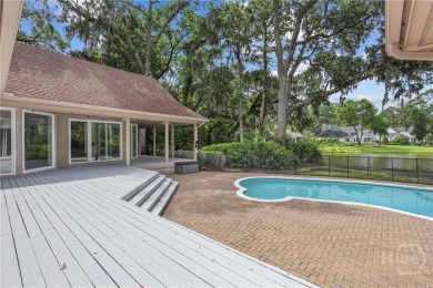 This beautifully updated home in The Landings offers privacy on The Landings Club - Palmetto in Georgia - for sale on GolfHomes.com, golf home, golf lot