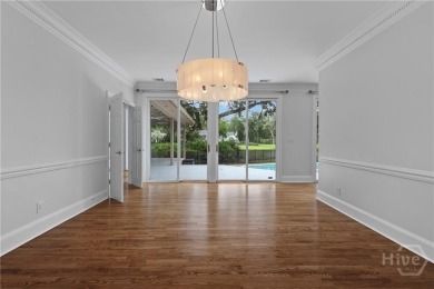 This beautifully updated home in The Landings offers privacy on The Landings Club - Palmetto in Georgia - for sale on GolfHomes.com, golf home, golf lot