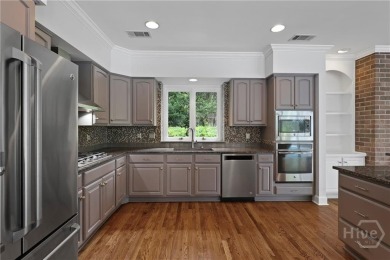 This beautifully updated home in The Landings offers privacy on The Landings Club - Palmetto in Georgia - for sale on GolfHomes.com, golf home, golf lot