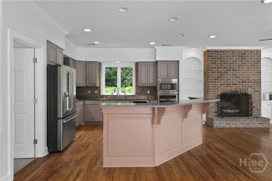 This beautifully updated home in The Landings offers privacy on The Landings Club - Palmetto in Georgia - for sale on GolfHomes.com, golf home, golf lot