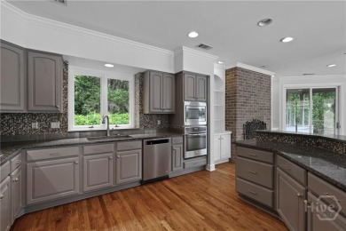This beautifully updated home in The Landings offers privacy on The Landings Club - Palmetto in Georgia - for sale on GolfHomes.com, golf home, golf lot