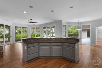 This beautifully updated home in The Landings offers privacy on The Landings Club - Palmetto in Georgia - for sale on GolfHomes.com, golf home, golf lot