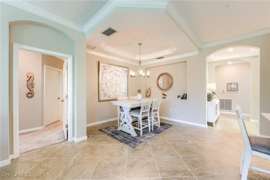 The stunning Corsica design is situated in the sought-after on Pelican Preserve Golf Club in Florida - for sale on GolfHomes.com, golf home, golf lot