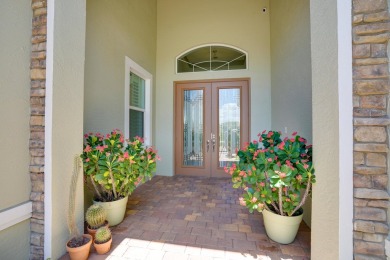 Exquisite home situated on a quiet dead end street, boasting on PGA Golf Club in PGA Village in Florida - for sale on GolfHomes.com, golf home, golf lot