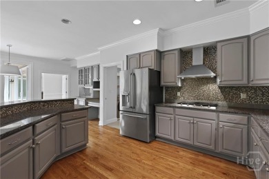 This beautifully updated home in The Landings offers privacy on The Landings Club - Palmetto in Georgia - for sale on GolfHomes.com, golf home, golf lot