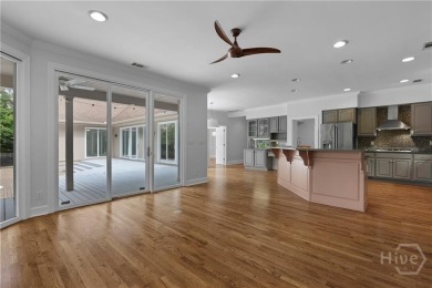 This beautifully updated home in The Landings offers privacy on The Landings Club - Palmetto in Georgia - for sale on GolfHomes.com, golf home, golf lot