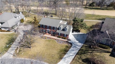 Welcome to this updated two-story colonial home, backing up to on Leawood South Country Club in Kansas - for sale on GolfHomes.com, golf home, golf lot