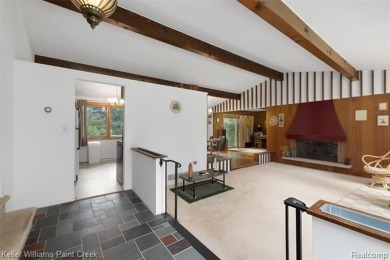 Step into this one-of-a-kind mid-century modern home tucked away on Kensington Metropark Golf Course in Michigan - for sale on GolfHomes.com, golf home, golf lot
