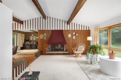 Step into this one-of-a-kind mid-century modern home tucked away on Kensington Metropark Golf Course in Michigan - for sale on GolfHomes.com, golf home, golf lot