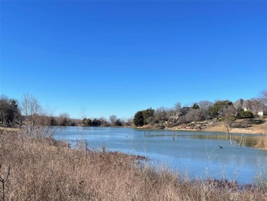 This unique waterfront property in the Lake Ridge community of on Tangle Ridge Golf Club in Texas - for sale on GolfHomes.com, golf home, golf lot