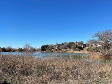 This unique waterfront property in the Lake Ridge community of on Tangle Ridge Golf Club in Texas - for sale on GolfHomes.com, golf home, golf lot