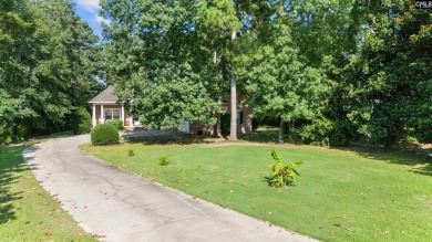 PRICE IMPROVED, with a NEW ROOF 2023! Welcome Home, located on Woodside Plantation Country Club in South Carolina - for sale on GolfHomes.com, golf home, golf lot