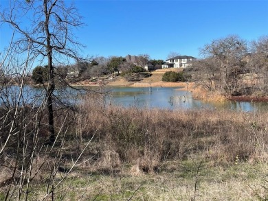 This unique waterfront property in the Lake Ridge community of on Tangle Ridge Golf Club in Texas - for sale on GolfHomes.com, golf home, golf lot