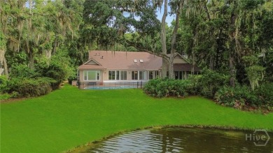 This beautifully updated home in The Landings offers privacy on The Landings Club - Palmetto in Georgia - for sale on GolfHomes.com, golf home, golf lot