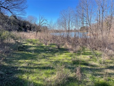 This unique waterfront property in the Lake Ridge community of on Tangle Ridge Golf Club in Texas - for sale on GolfHomes.com, golf home, golf lot