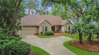 This beautifully updated home in The Landings offers privacy on The Landings Club - Palmetto in Georgia - for sale on GolfHomes.com, golf home, golf lot
