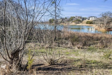 This unique waterfront property in the Lake Ridge community of on Tangle Ridge Golf Club in Texas - for sale on GolfHomes.com, golf home, golf lot